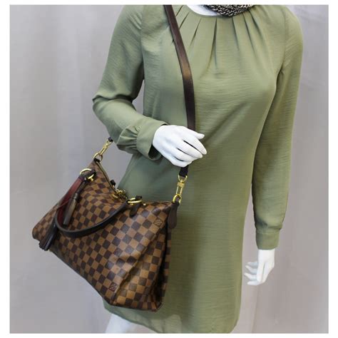 louis vuitton lymington handbag.